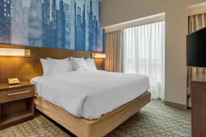 Postel nebo postele na pokoji v ubytování Residence Inn Providence Downtown + 25 fotografií