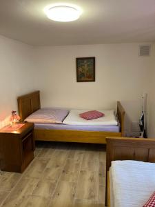 Postel nebo postele na pokoji v ubytování Chalupa Františkov