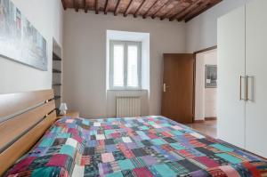 Posteľ alebo postele v izbe v ubytovaní Lucca - Piazza dell’Anfiteatro Central Apartment!