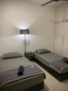 Katil atau katil-katil dalam bilik di Dwiputra Presint 15 at Putrajaya