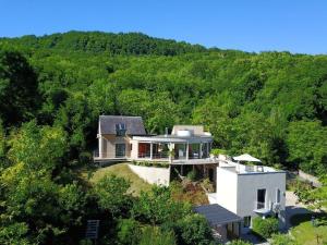 an aerial view of a house in the woods at La Désirade in Salles-la-Source