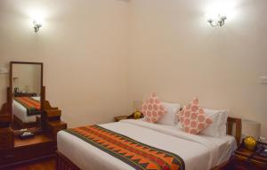 Postel nebo postele na pokoji v ubytování Ibex Resorts, Coonoor Leewood