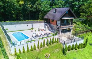 an overhead view of a house with a swimming pool at Lovely Home In Donja Stubica With Outdoor Swimming Pool in Donja Stubica