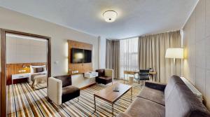 Posezení v ubytování Business Hotel Astrum Laus