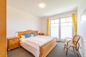 Postel nebo postele na pokoji v ubytování Haus Arkonablick - Fewo 1 04 Dünenblick