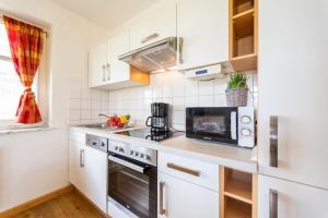 Kuchyň nebo kuchyňský kout v ubytování Haus Arkonablick - Fewo 1 04 Dünenblick