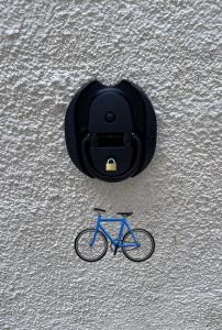 a bike is sitting in front of a speaker at L'Atypique T3 Stanislas Maisonnette avec cour in Orléans