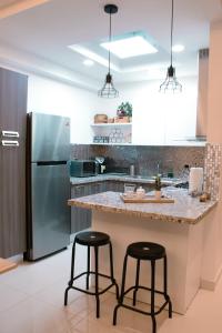 Kuchyň nebo kuchyňský kout v ubytování Cozy & Coqueto Paraíso Apartament