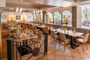 Ein Restaurant oder anderes Speiselokal in der Unterkunft Family & Sporthotel Kärntnerhof 