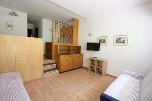 Ένα ή περισσότερα κρεβάτια σε δωμάτιο στο Residence Copai +65 φωτογραφίες