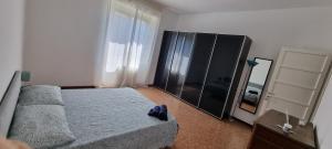 Letto o letti in una camera di B&B I due tigli