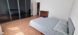 Letto o letti in una camera di B&B I due tigli