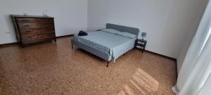 Letto o letti in una camera di B&B I due tigli
