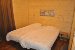 Postel nebo postele na pokoji v ubytování Family friendly appt on the slopes