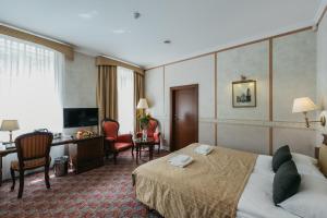 TV a/nebo společenská místnost v ubytování Hotel Rinno