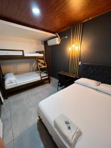 Voodi või voodid majutusasutuse Hotel Almalu toas