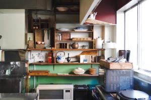 a kitchen with lots of shelves and a microwave at Ryokan Yuzawa - Vacation STAY 14222v in Yuzawa