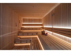 a sauna with wooden benches in a wooden at Swandor Hotels & Resorts - Kemer in Kemer