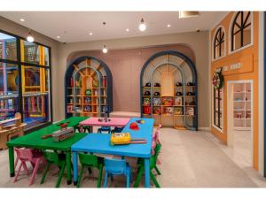 a room with tables and chairs in a store at Swandor Hotels & Resorts - Kemer in Kemer