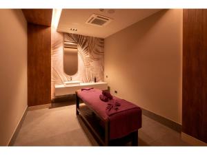 a small room with a bench and a window at Swandor Hotels & Resorts - Kemer in Kemer
