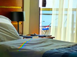 Letto o letti in una camera di De La Costa Hotel