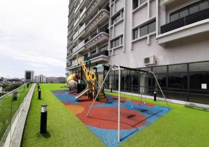 a playground on the side of a building at T STAY at Icon Residence -for 1 Room Free Netflix & Pool in Kuala Terengganu