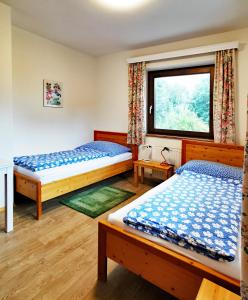 Postel nebo postele na pokoji v ubytování Ferienwohnung Eichler