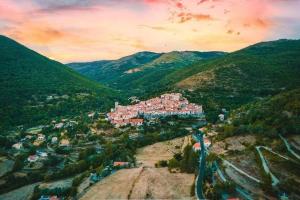 an aerial view of a town in the mountains at Casa del Sola in Mosset