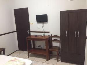 TV a/nebo společenská místnost v ubytování ORSI HOTEL