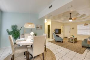 a dining room and living room with a table and chairs at Welcoming Edinburg Apartment - Pet Friendly! in Edinburg