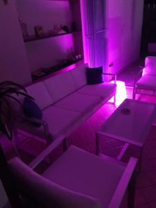 Posezení v ubytování Sentirsi a casa