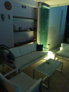 Posezení v ubytování Sentirsi a casa