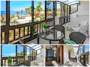 a house with a balcony with a view of the ocean at LUX Parque Santiago2 Las Americas First Line in Playa de las Americas