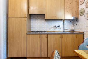 Kuchyň nebo kuchyňský kout v ubytování Casa nel Borgo Iris