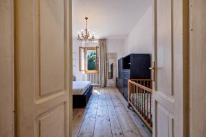 Postel nebo postele na pokoji v ubytování Casa nel Borgo Iris