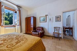 Postel nebo postele na pokoji v ubytování Casa nel Borgo Iris