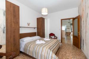 Katil atau katil-katil dalam bilik di Torino Pitagora Functional Flat