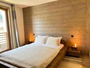 Posteľ alebo postele v izbe v ubytovaní Appartement 3 Chambres au Centre des Gets avec Balcon, Parking et Cheminée - FR-1-623-333