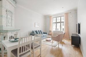 Χώρος καθιστικού στο WeHost Fabulous 2BR in Prestigious Punavuori @Iso Roobertinkatu 26