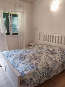 Postel nebo postele na pokoji v ubytování B&B La Casa Gialla
