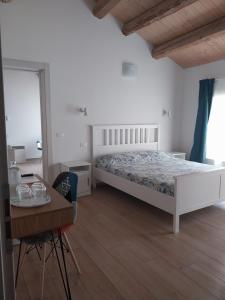 Postel nebo postele na pokoji v ubytování B&B La Casa Gialla