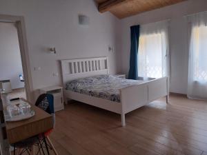 Postel nebo postele na pokoji v ubytování B&B La Casa Gialla