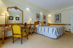 Postel nebo postele na pokoji v ubytování Olissippo Lapa Palace – The Leading Hotels of the World
