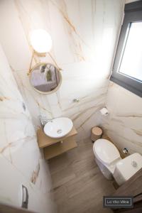 Koupelna v ubytování La Vita Villas