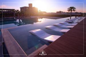Bazén v ubytování Nirvana Resort & Spa nebo v jeho okolí