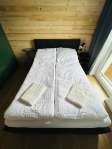 Postelja oz. postelje v sobi nastanitve Apartament LOFTykocin