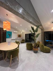 Posezení v ubytování Le Petit Hôtel de Pianottoli-Caldarello