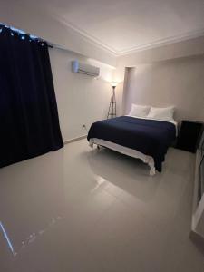 Ensanche Savica de MendozaにあるBlue Gem Retreat 3BR Apartment w Modern Amenitiesのギャラリーの写真