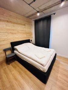 Postelja oz. postelje v sobi nastanitve Apartament LOFTykocin