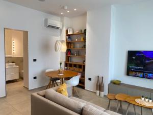 Telewizja i/lub zestaw kina domowego w obiekcie Lifestyle Apartments